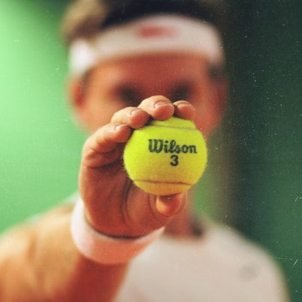 The man holding the Tennessee ball